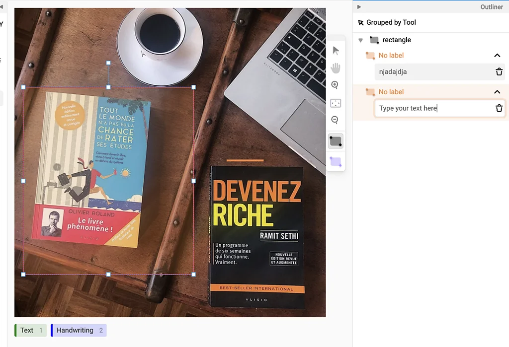 Rectangle annotation over books on a desk, labelled for text and handwriting